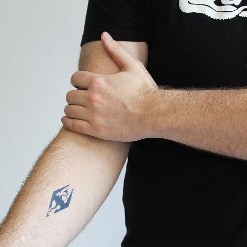 Akatosh by Miguel Romero is a Gaming & Fandom temporary tattoo from inkbox - 0