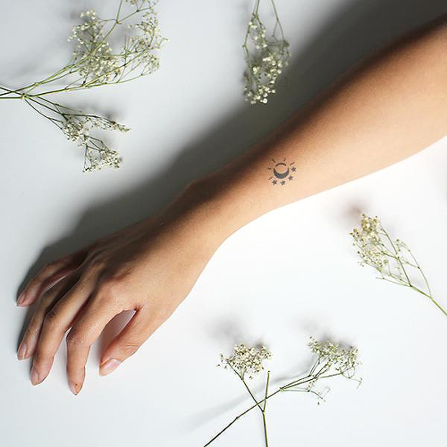 Esmara by Tyler Rehberg is a Minimal temporary tattoo from inkbox - 0