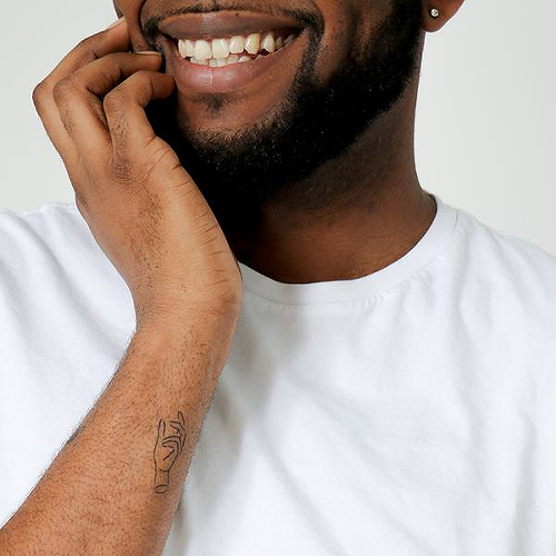 Evgenis by Karmen Man is a Minimal temporary tattoo from inkbox - 0