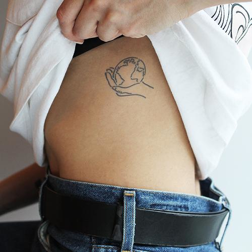 Globey Times by Curt Montgomery is a temporary tattoo from inkbox - 0