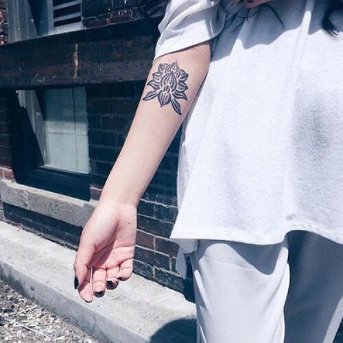 Nelumbo by Nikki Di Biasio is a Flowers temporary tattoo from inkbox - 1