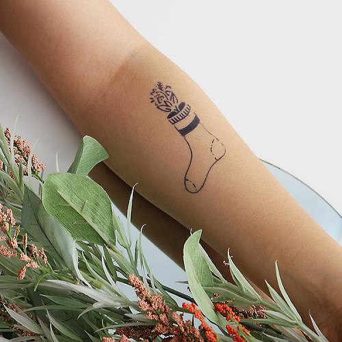 Ponozka by Mikie Jae is a Flowers temporary tattoo from inkbox - 0
