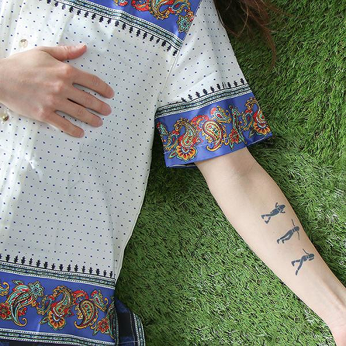 Shuffle by Elena Cruz is a Body temporary tattoo from inkbox - 0