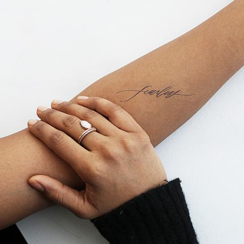 Valiant by Written Word Calligraphy is a Words temporary tattoo from inkbox - 0