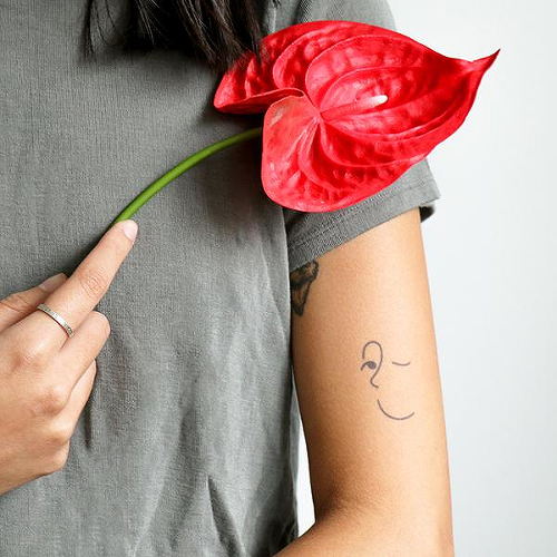 Zwinkern by Kaleigh Dandeneau is a Minimal temporary tattoo from inkbox - 0